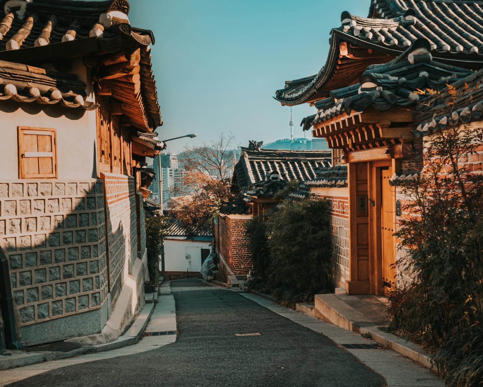 Bukchon Hanok Village in Seoul where traditional houses host small art galleries and craft studios