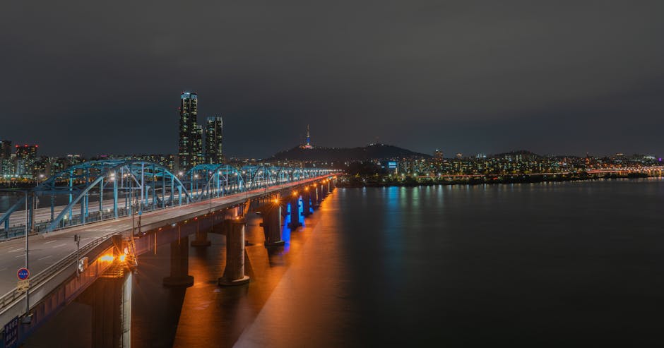 Captivating night view of Seoul illuminated skyline and a Han River bridge