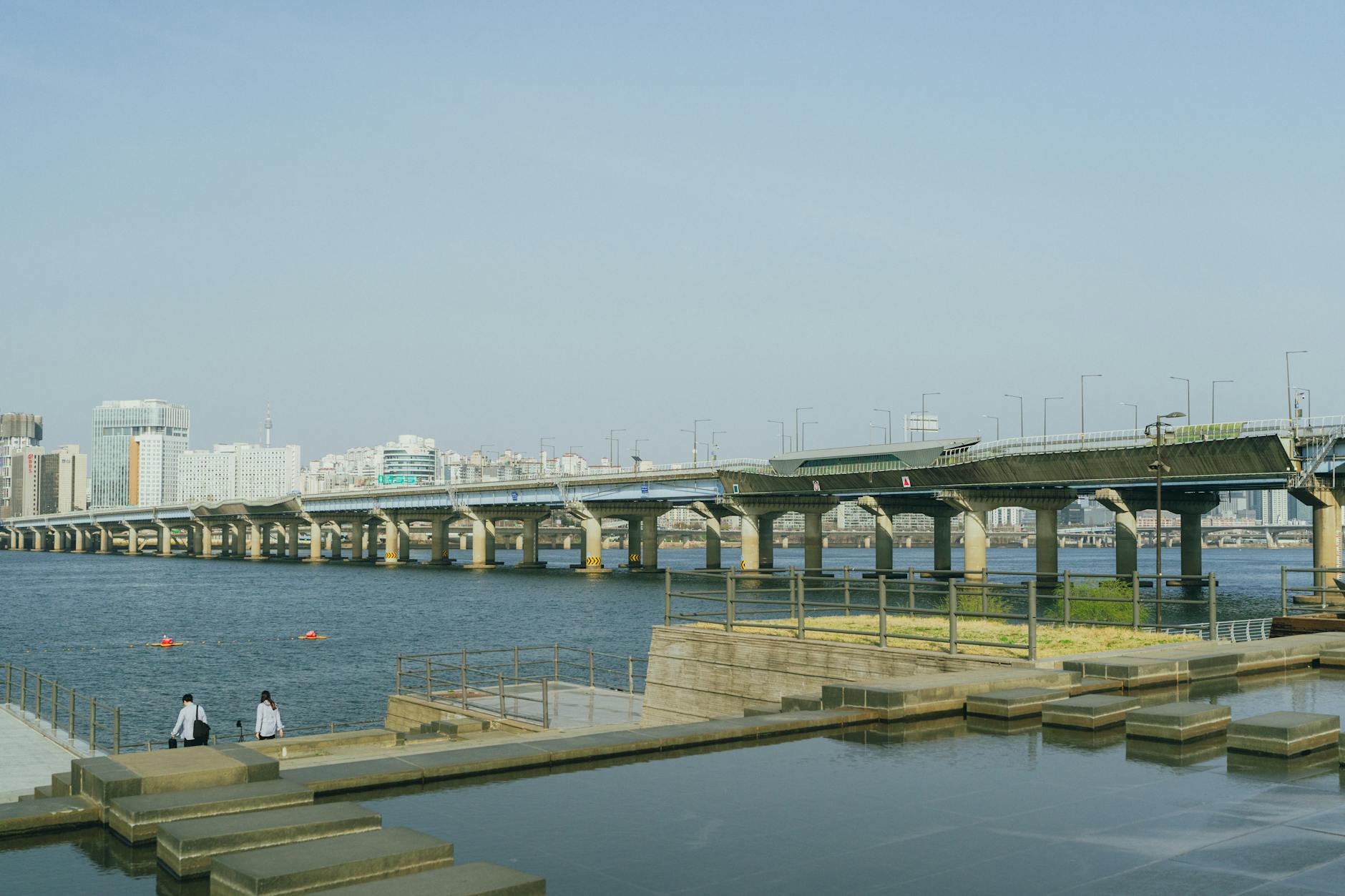 Han River park with Seoul skyline in the background
