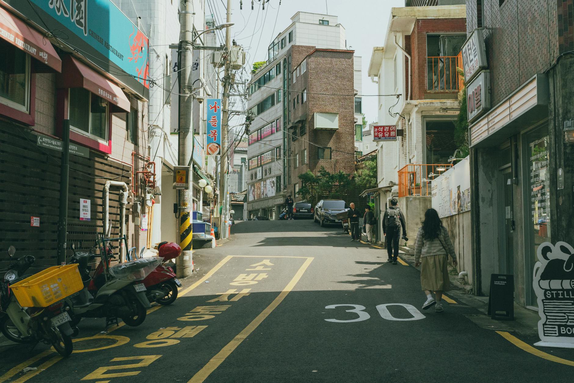 Vibrant Hongdae street scene in Seoul with shops and cafes