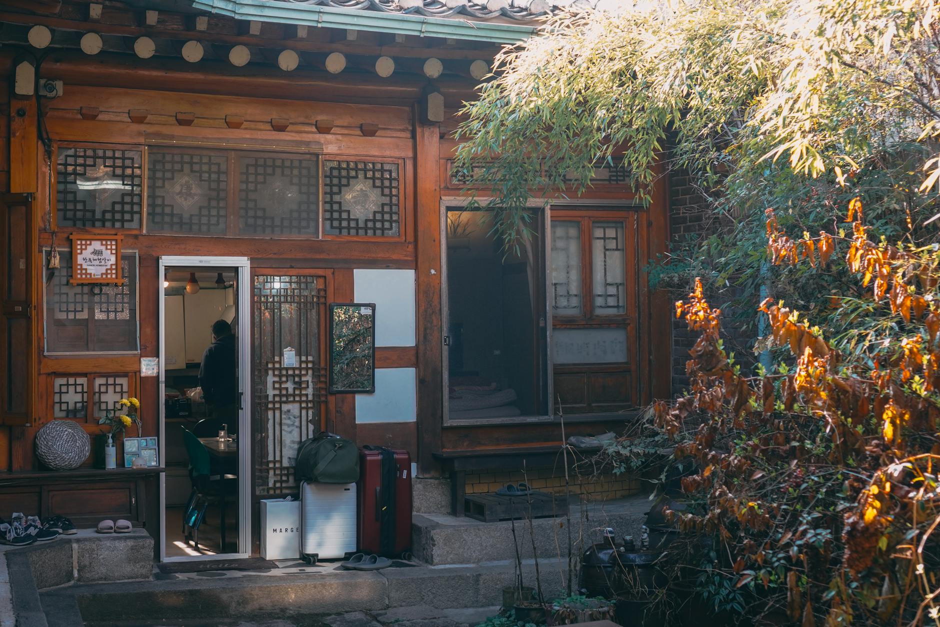 Hanok cafe in Ikseon-dong with wooden beams and seating inside a converted traditional house