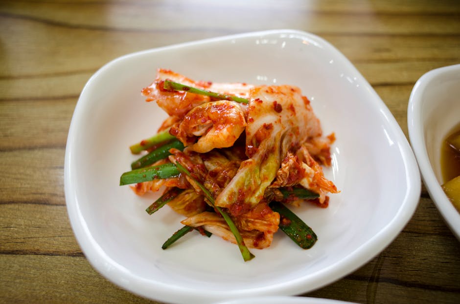 Bowl of fresh kimchi fermented Napa cabbage Korean side dish