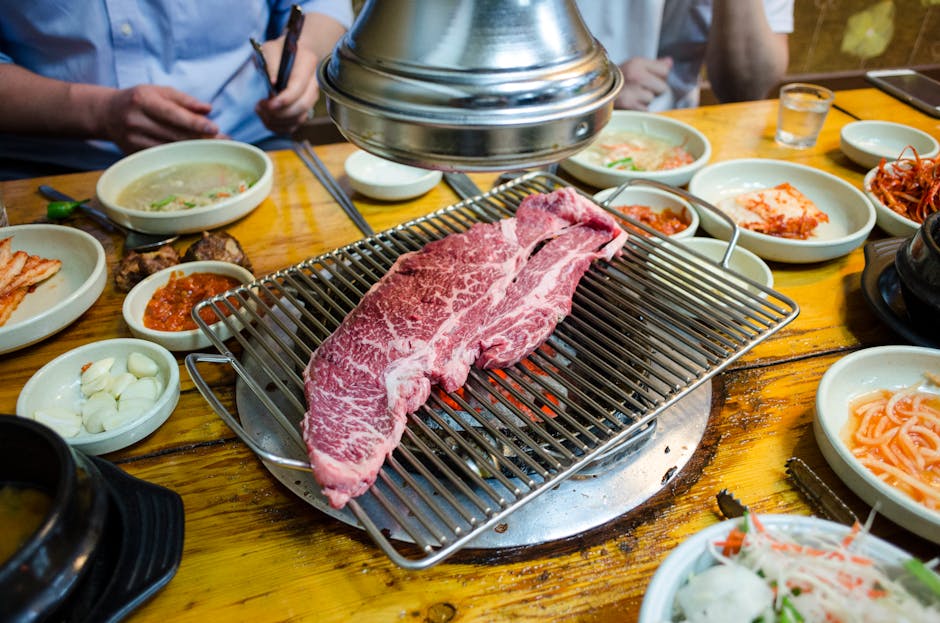 Korean BBQ dining table where elders cook for guests in Seoul