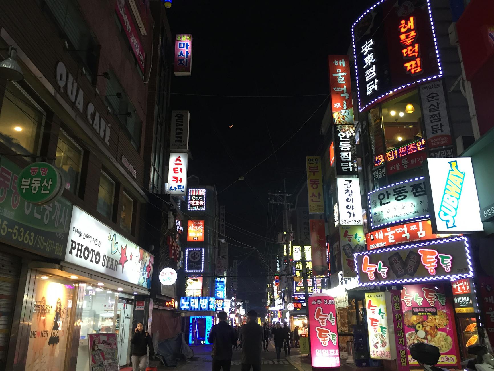 Crowded Korean BBQ restaurant in Seoul on a busy weekend night