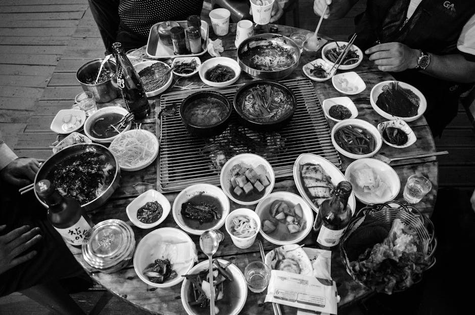 Family enjoying Korean meal at a traditional dining table in Seoul