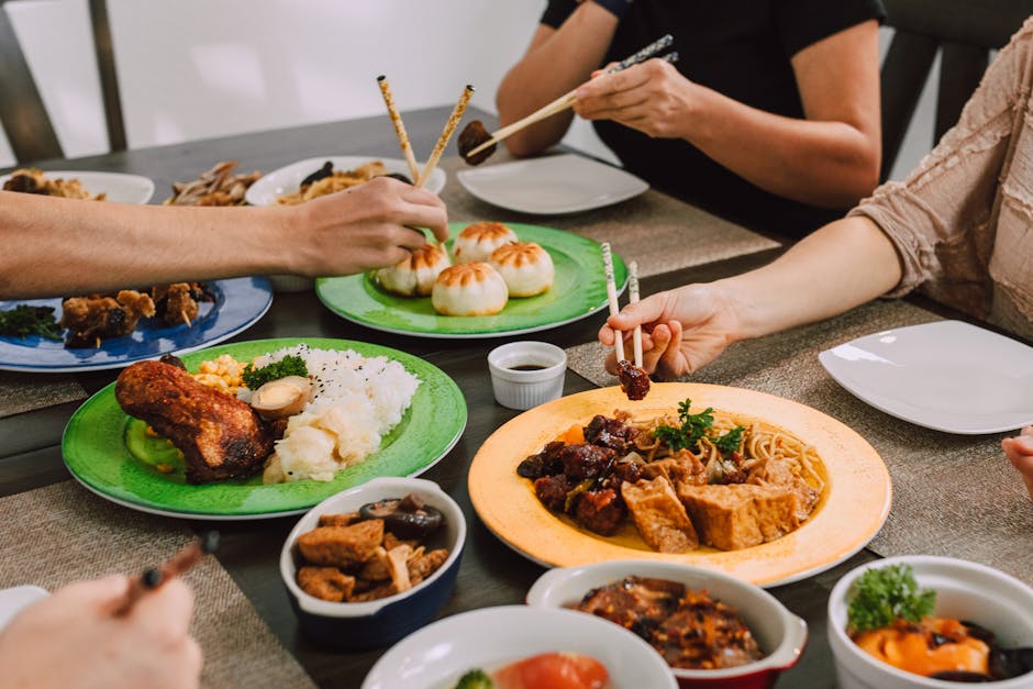 Korean diners sharing food across a communal table