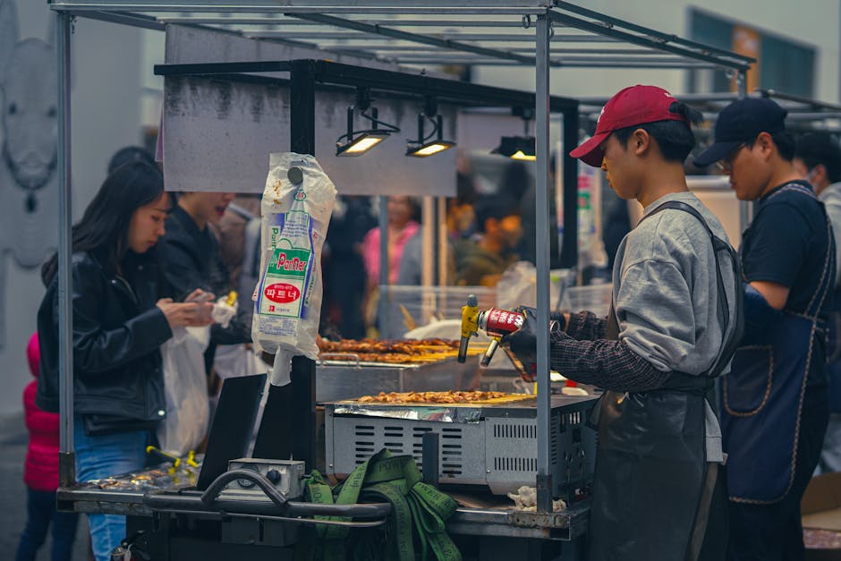 Korean street food vendor in Myeongdong night market Seoul