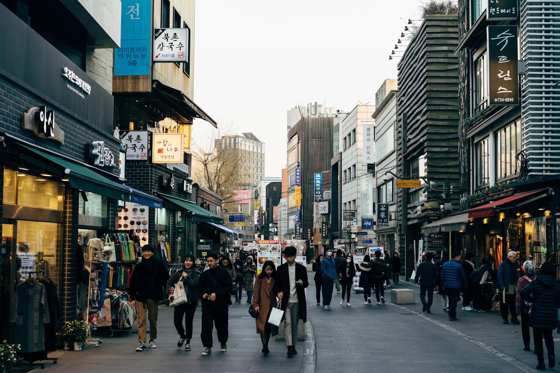 Myeongdong shopping street in Seoul bustling with visitors