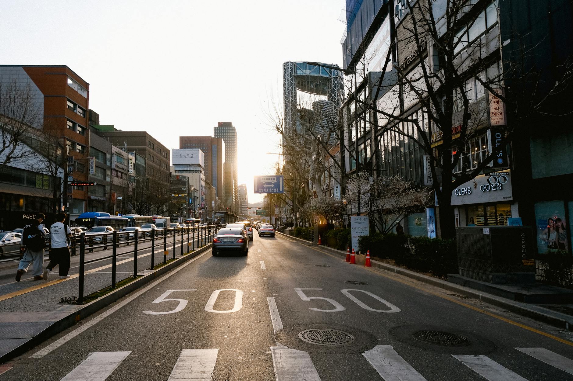 Seoul city street traffic with buses and cars during rush hour