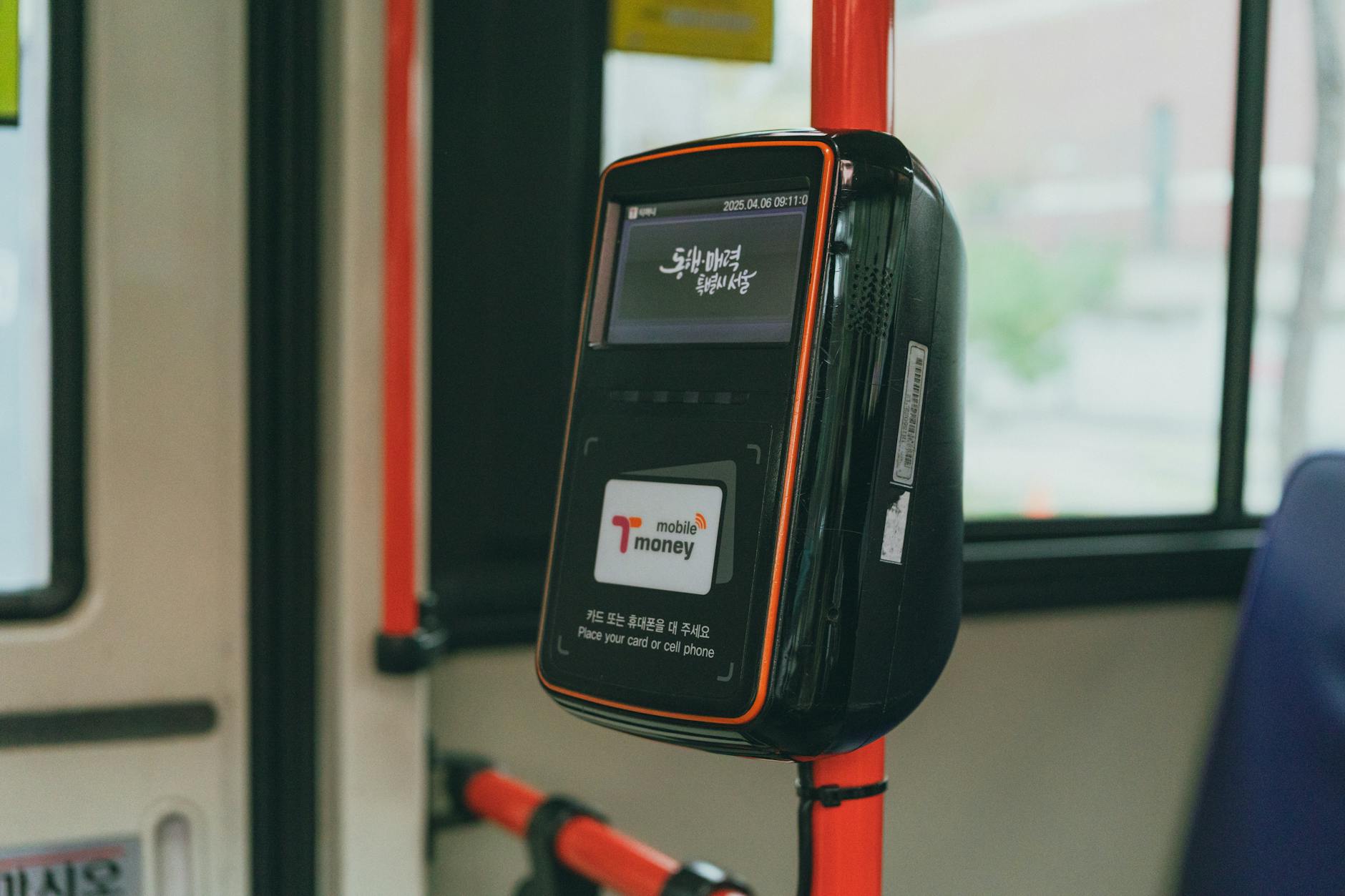 T-money transit card used to tap on a bus card reader in Seoul