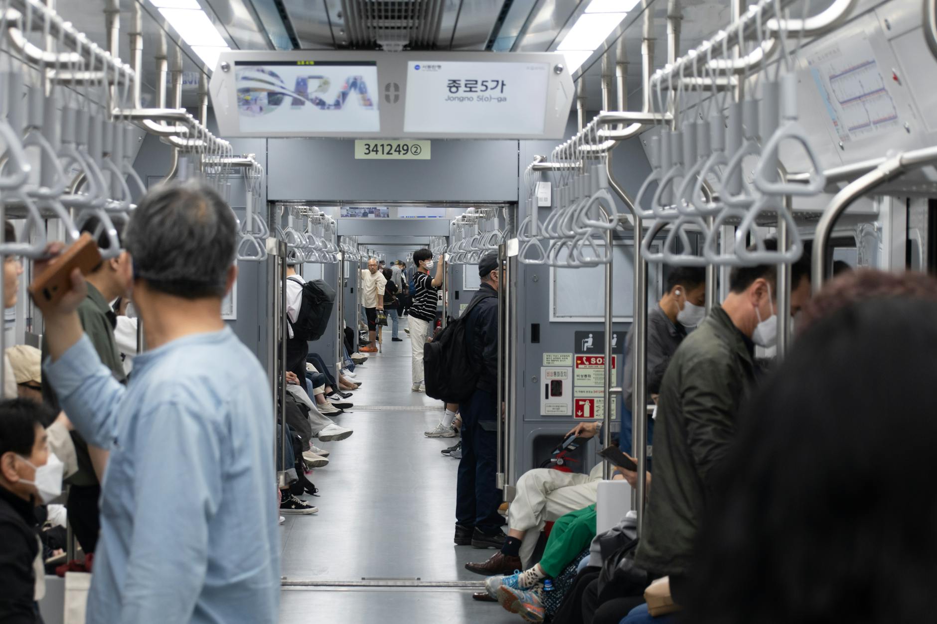 Modern Seoul subway train at a clean well-lit station