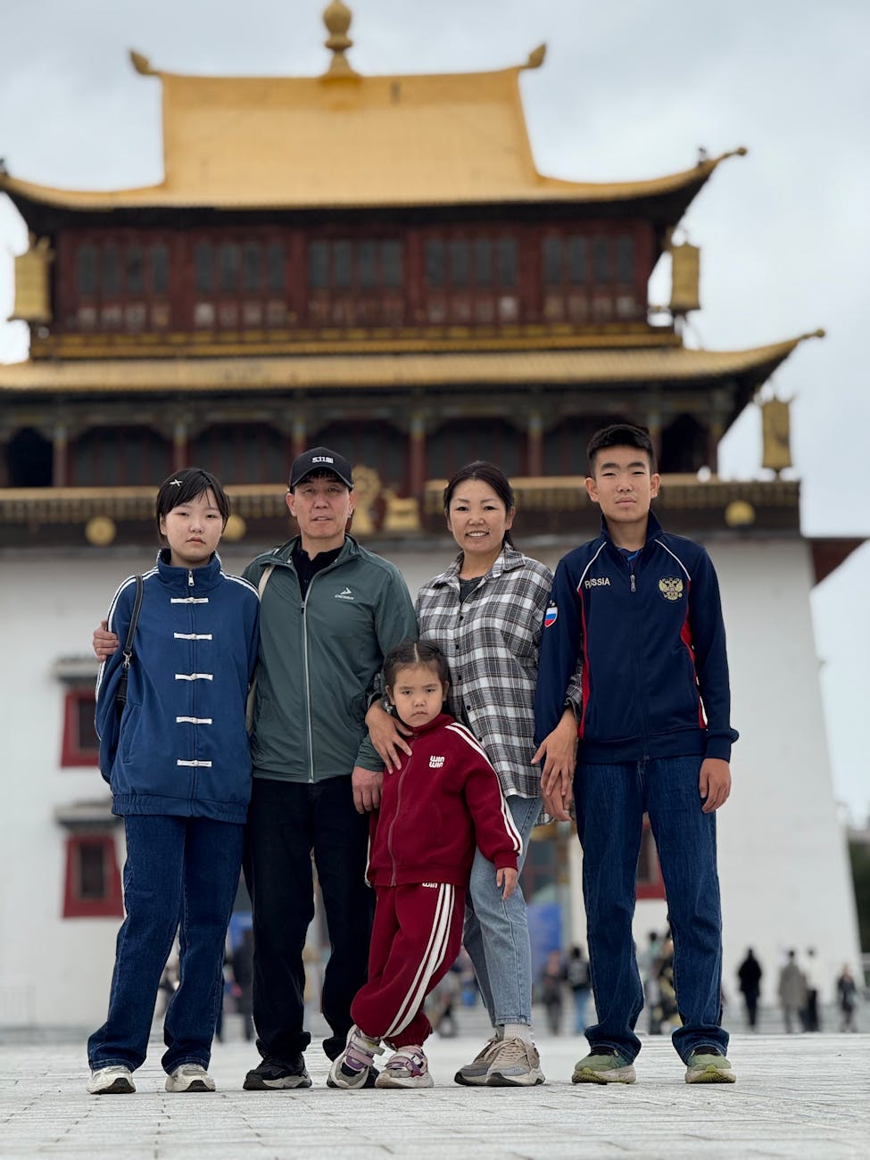 Family with children visiting a traditional Korean palace in Seoul