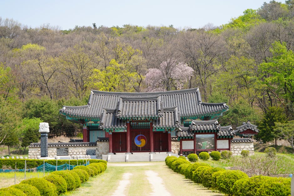 Serene traditional Korean temple nestled in a lush springtime forest near Seoul