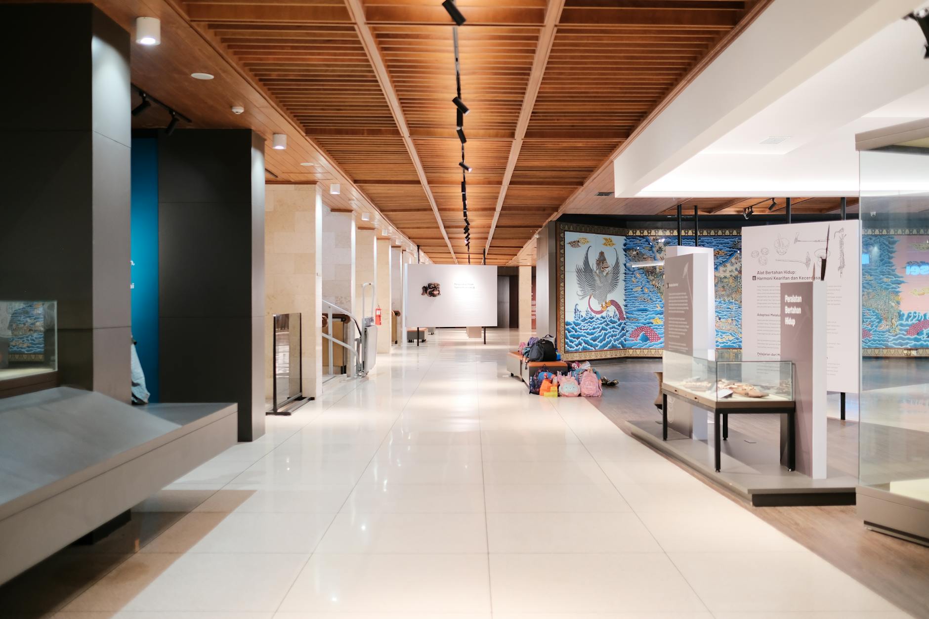 Interior of a Seoul museum with visitors exploring exhibitions and galleries