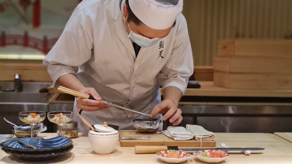 Omakase sushi chef preparing nigiri at a Seoul Michelin restaurant