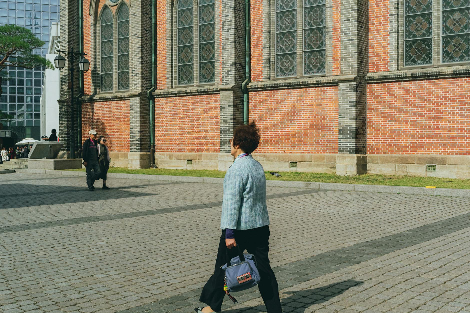 Solo female traveler safely exploring the streets of Seoul South Korea