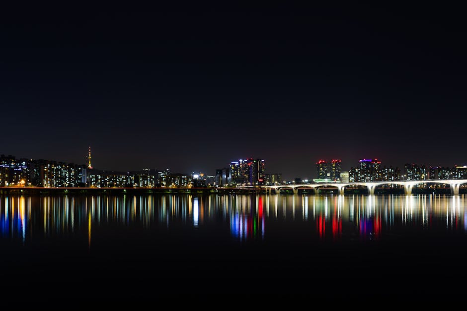 Seoul illuminated skyline reflected over the Han River at night