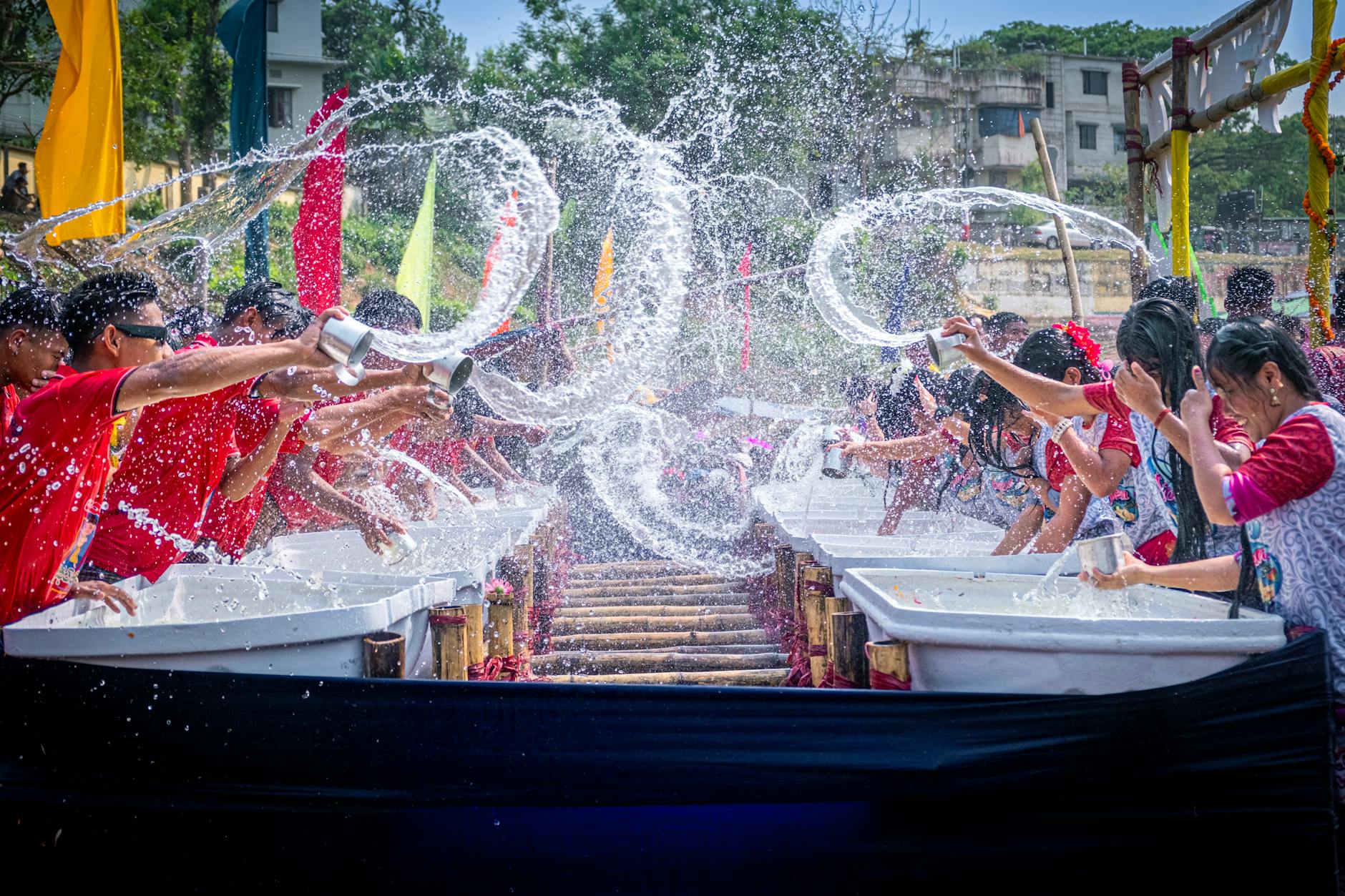 People enjoying an outdoor summer water festival in Seoul