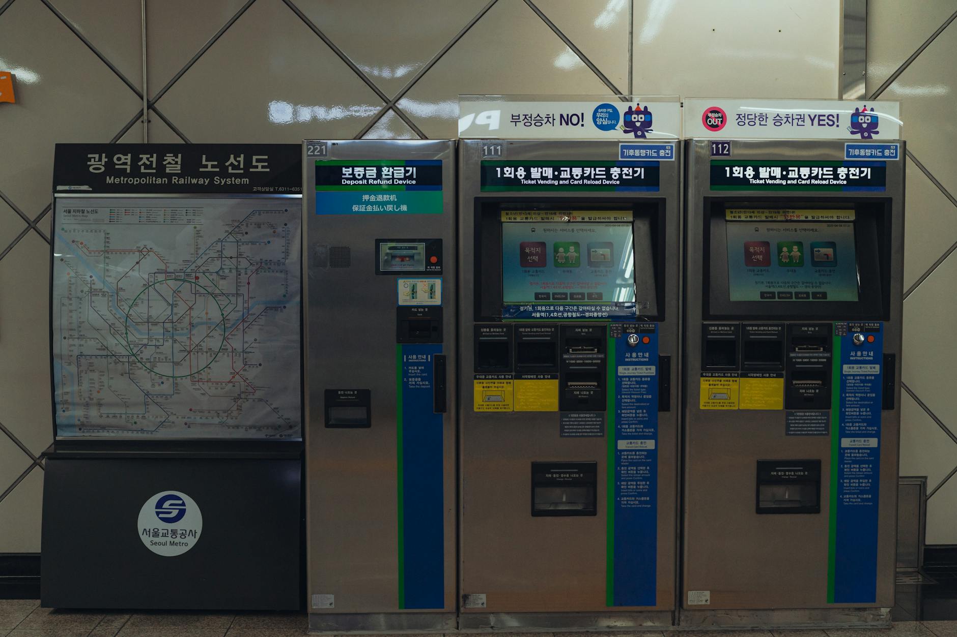 Digital subway map display in Seoul metro station helping tourists navigate the system