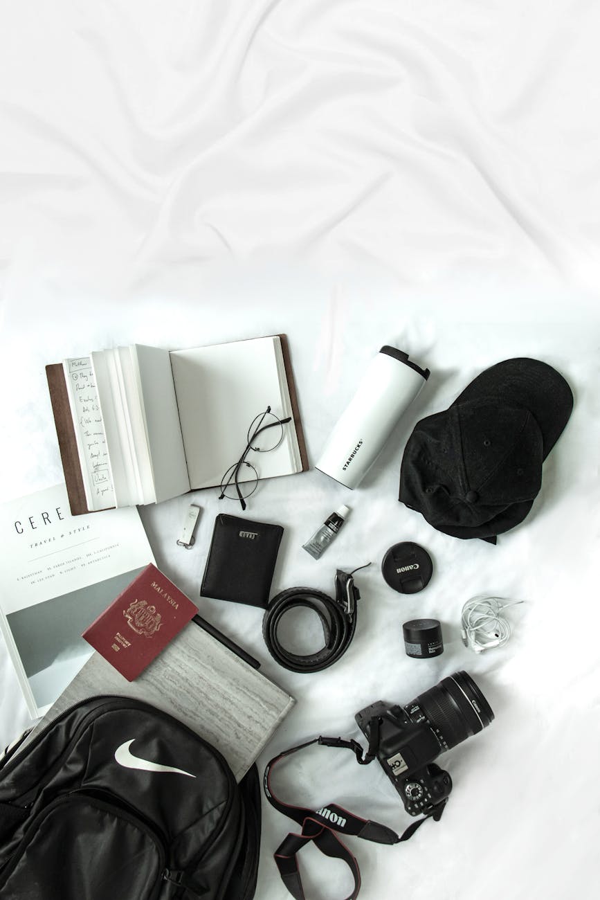 Flat lay of travel essentials for a Seoul packing list