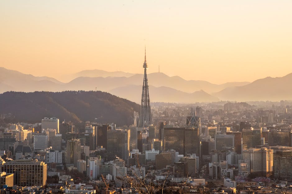 Panoramic view of Seoul skyline during sunset, perfect for a 7 day itinerary