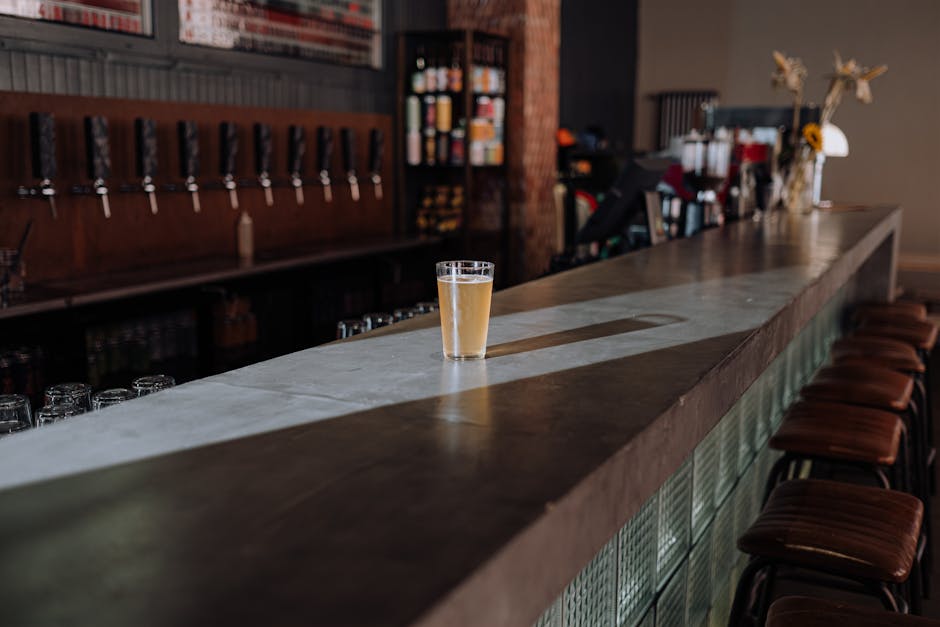 Refreshing glass of craft beer at a sleek Seoul bar counter