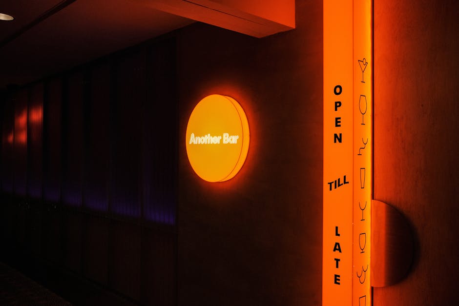 Vibrant neon signage at a Seoul bar open late into the night
