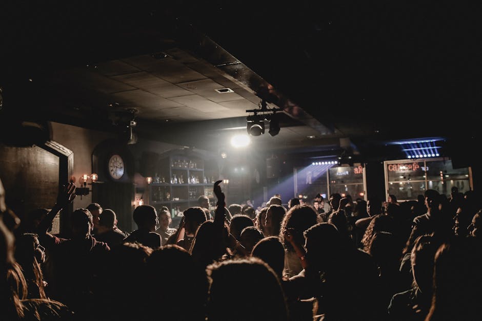 Energetic crowd enjoying a lively Seoul night at a bustling nightclub