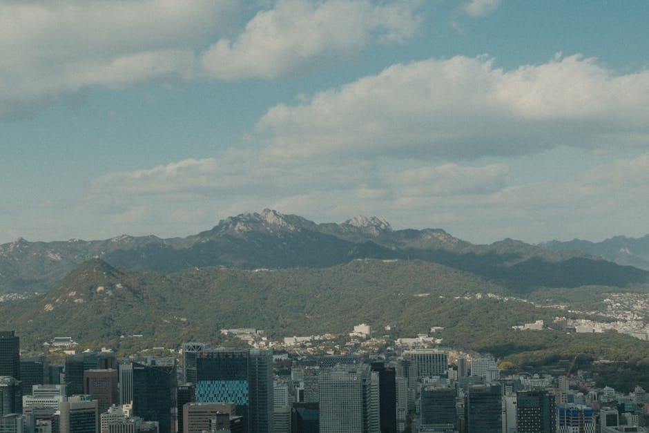 Panoramic view of Seoul skyline with Bukhansan mountains background
