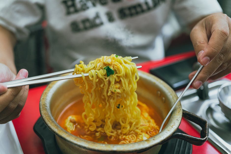 Delicious Korean ramen served hot with chopsticks in a budget Seoul restaurant
