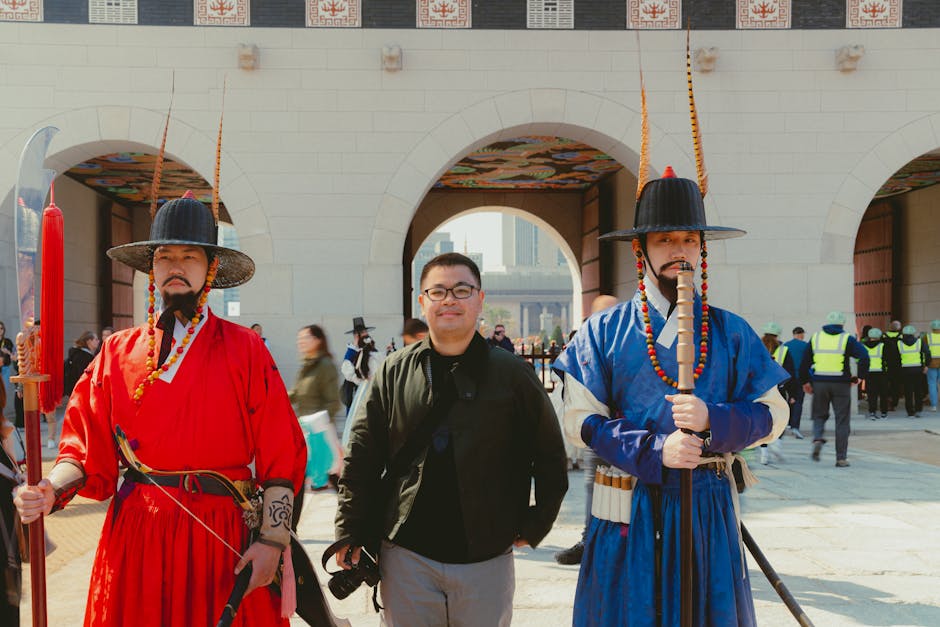 Visitor posing with traditional palace guards at Gwanghwamun Gate Jongno