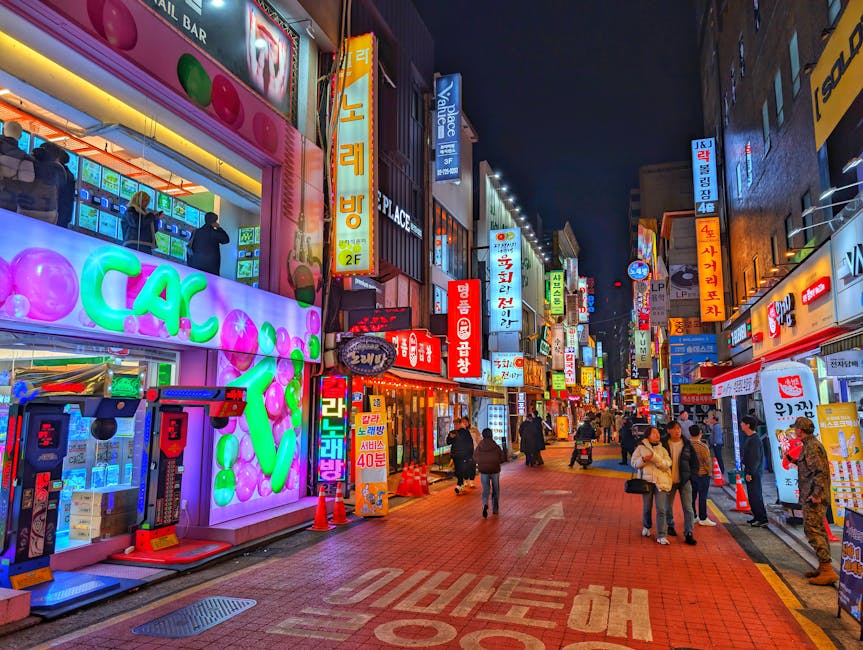 Vibrant Seoul nightlife street with neon signs near karaoke noraebangs