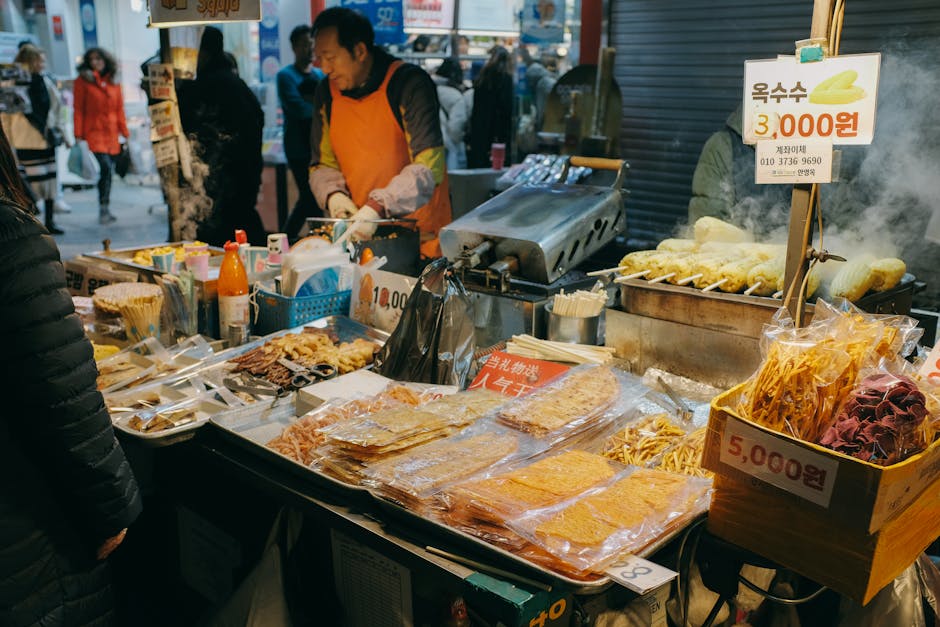 Colorful street food market in Seoul showcasing Korean snacks at night