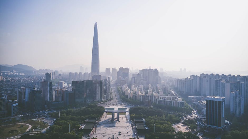 Aerial view of Seoul skyline with Lotte World Tower covered by Discover Seoul Pass
