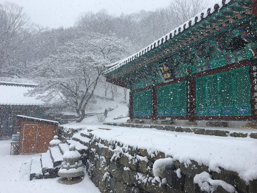 Snow covered Korean temple winter Seoul scenic peaceful