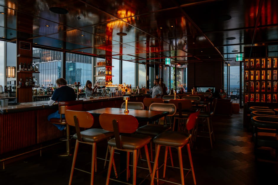 Warm rooftop bar with patrons enjoying drinks Seoul couples evening