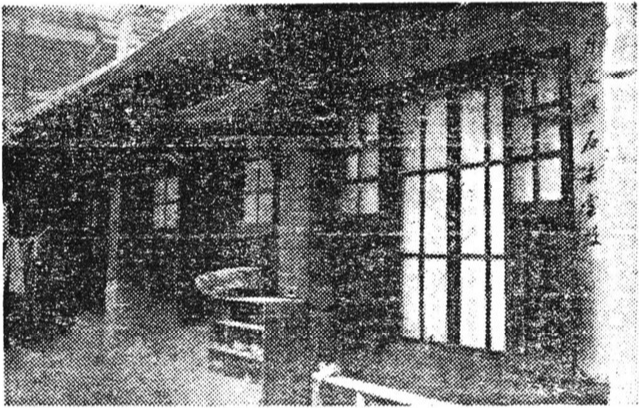 Grainy 1935 newspaper photograph of a small tiled hanok house with latticed glass windows in Ikseon-dong